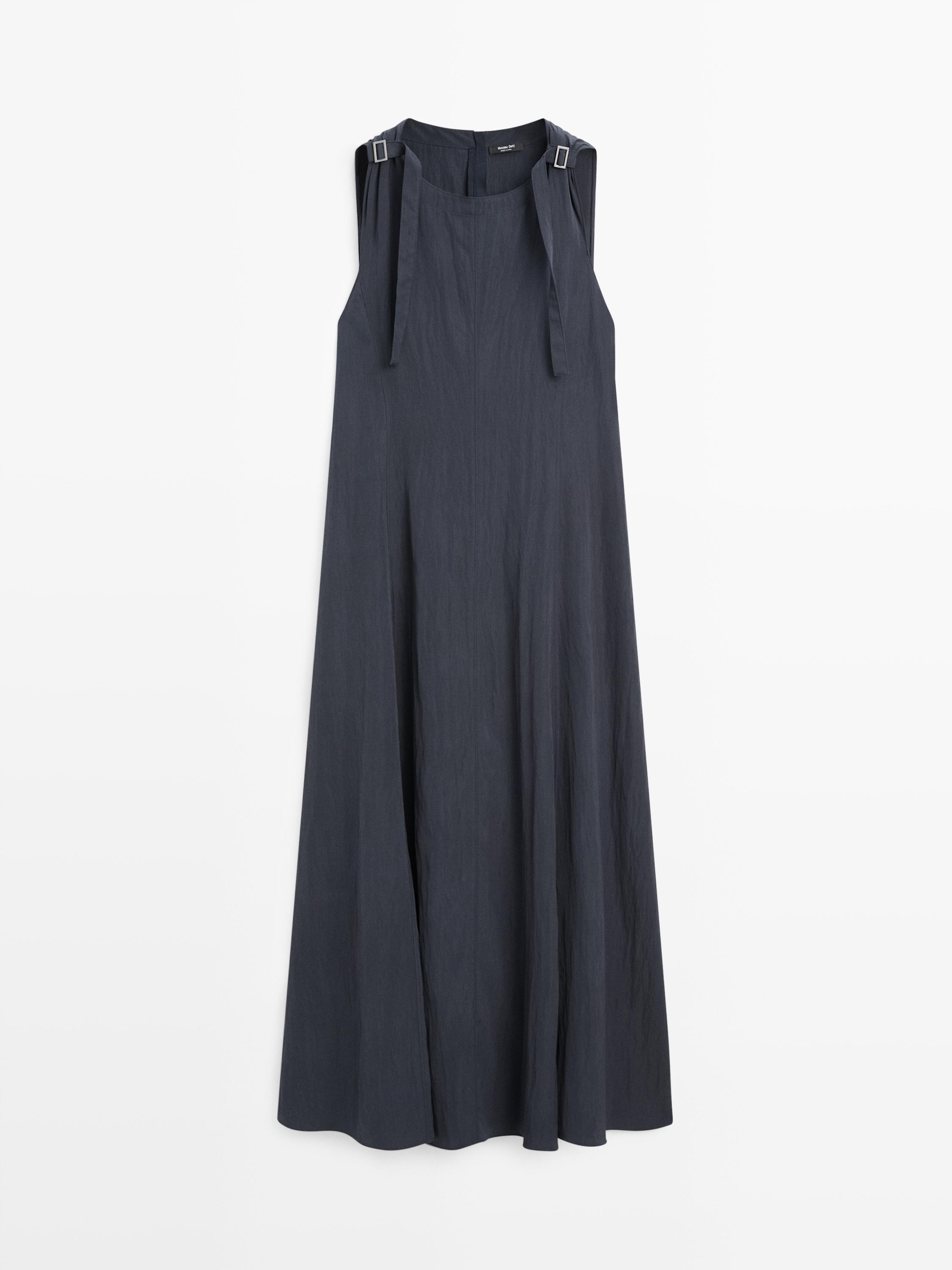 Flowing midi dress with buckles